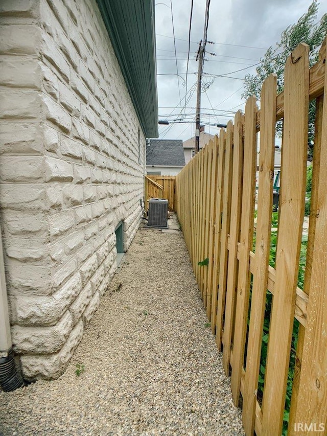 view of property exterior with cooling unit