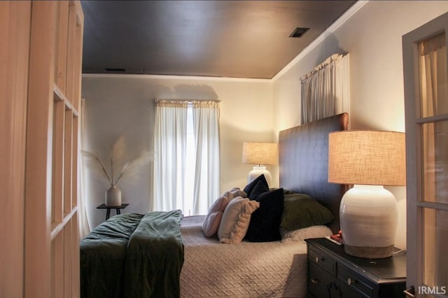 bedroom featuring ornamental molding