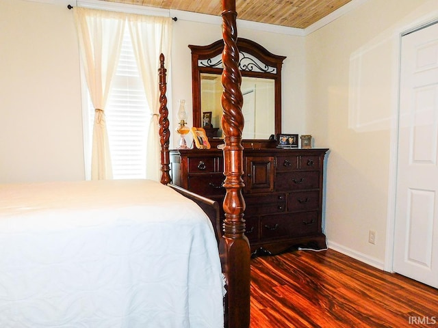 bedroom with hardwood / wood-style flooring, wood ceiling, and crown molding