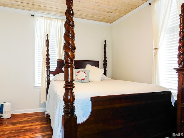 bedroom with vaulted ceiling, crown molding, wooden ceiling, and dark hardwood / wood-style floors