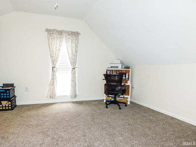 home office with carpet flooring and lofted ceiling