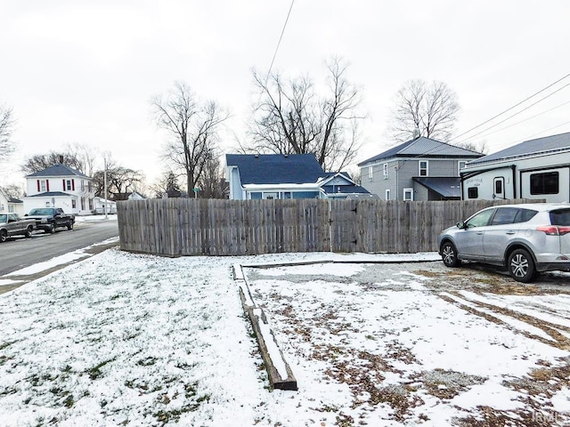 view of yard covered in snow