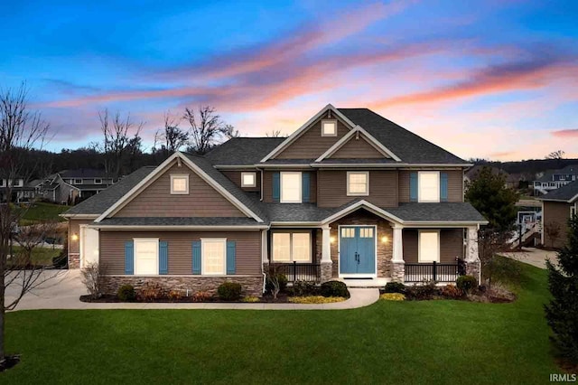 craftsman-style house featuring a yard