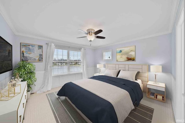 bedroom featuring ceiling fan and crown molding