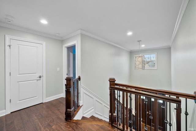 hall featuring dark hardwood / wood-style flooring and ornamental molding