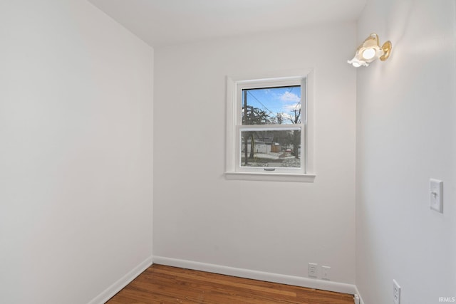 spare room featuring hardwood / wood-style flooring