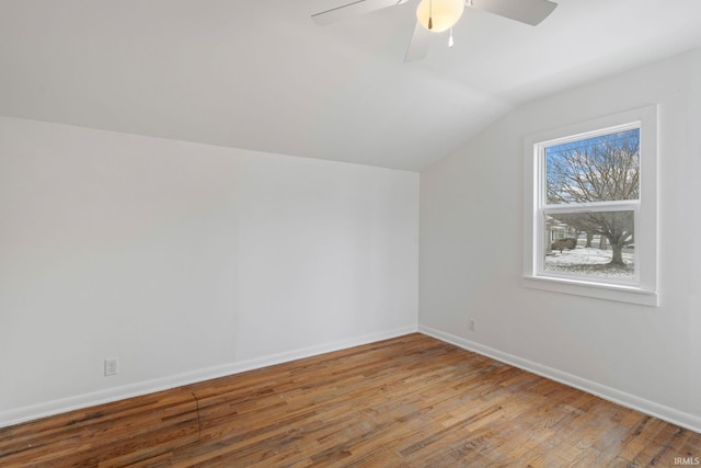 additional living space with wood-type flooring, ceiling fan, and lofted ceiling