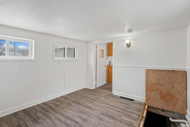 unfurnished room featuring wood-type flooring