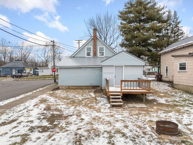 view of snow covered house