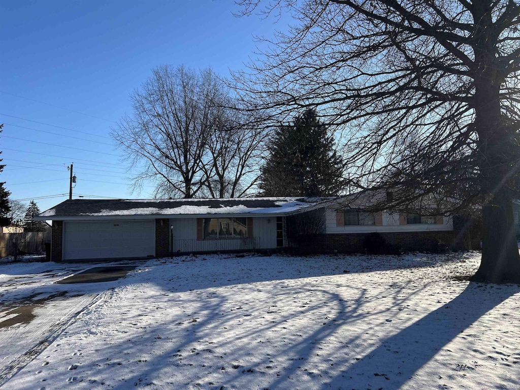 ranch-style home with a garage