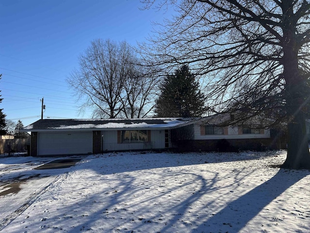 ranch-style home with a garage