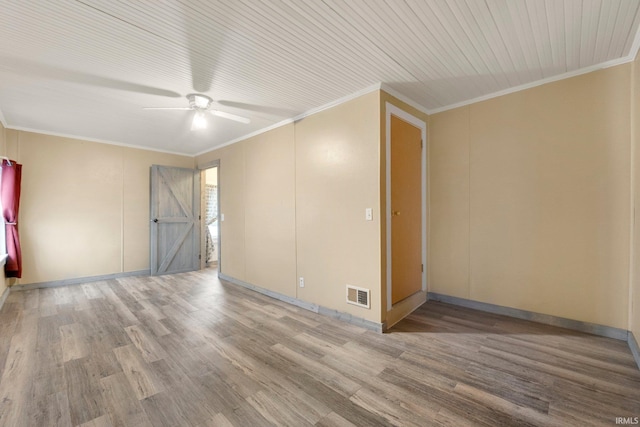 spare room with ceiling fan, hardwood / wood-style floors, and ornamental molding