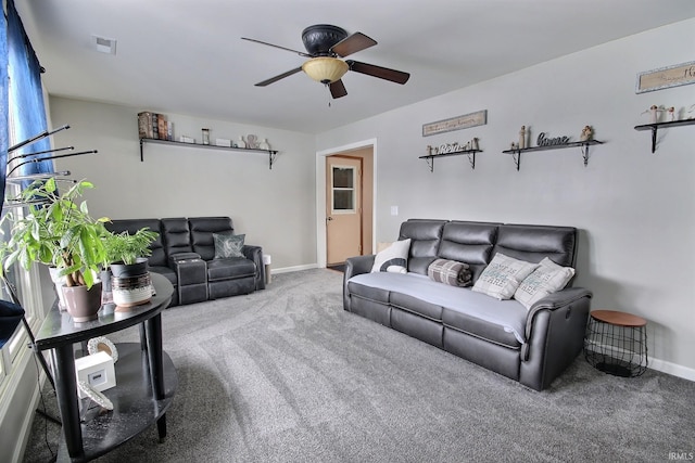 living room with carpet flooring and ceiling fan