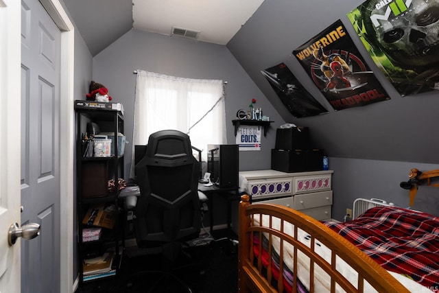 bedroom featuring vaulted ceiling