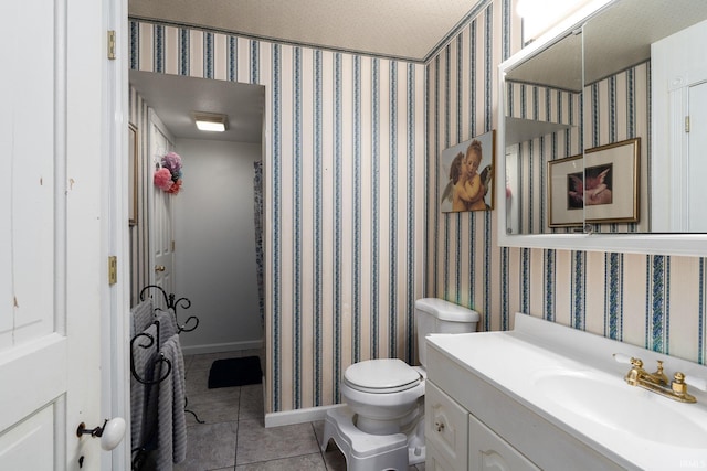 bathroom featuring a shower with curtain, vanity, a textured ceiling, tile patterned flooring, and toilet