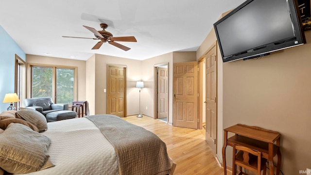 bedroom featuring ceiling fan and light hardwood / wood-style floors