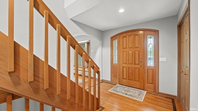 entryway with light hardwood / wood-style floors