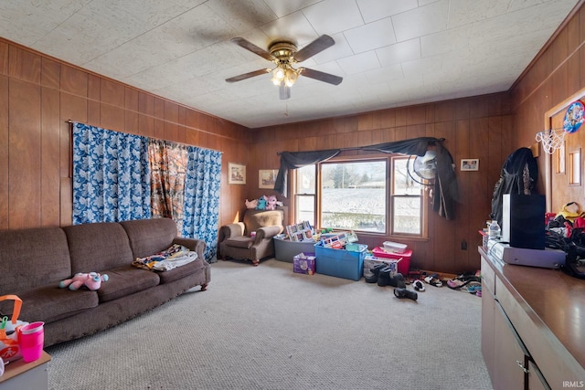 interior space featuring carpet flooring and wooden walls