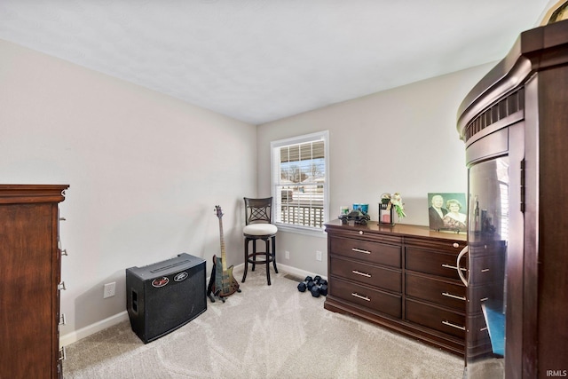 living area featuring light colored carpet