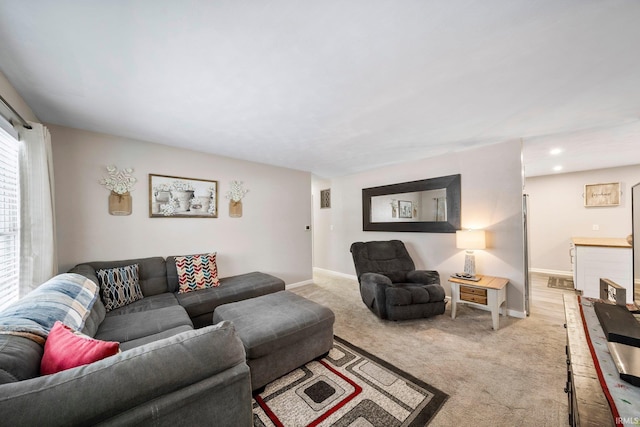 living room featuring light carpet