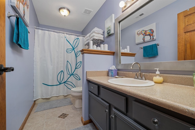 bathroom with tile patterned flooring, vanity, a shower with shower curtain, and toilet