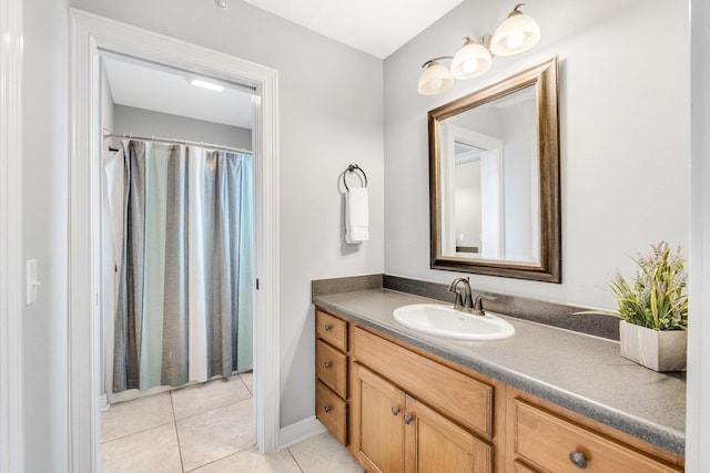 bathroom featuring tile patterned floors and vanity