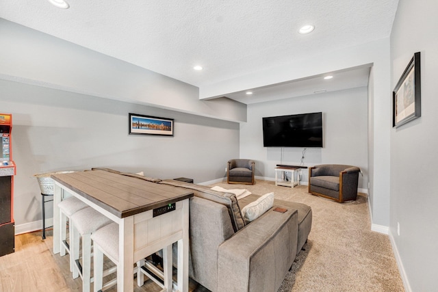 living room featuring a textured ceiling