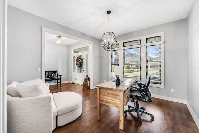 office with dark hardwood / wood-style floors and a chandelier