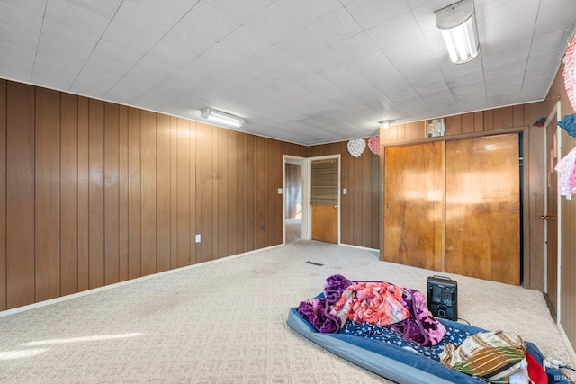 carpeted bedroom featuring a closet