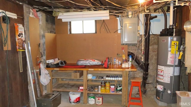 basement with electric panel and water heater