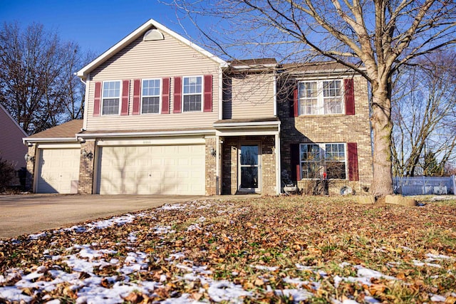 view of front of property with a garage