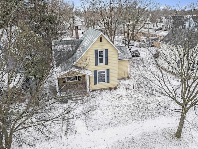 view of snow covered property