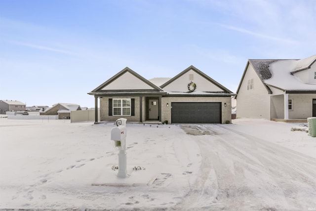 ranch-style home featuring a garage