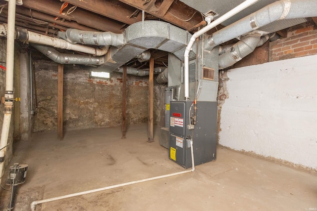 basement featuring heating unit