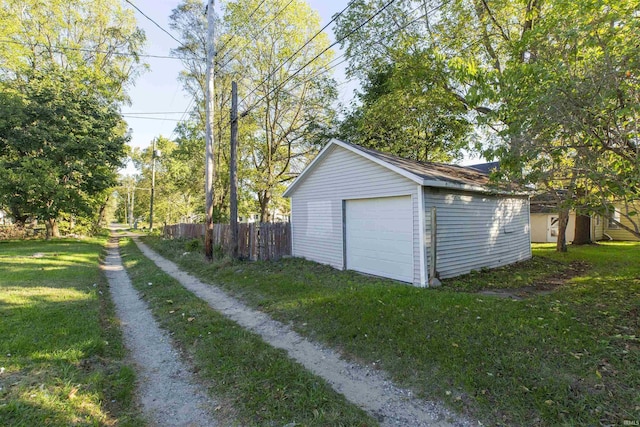 garage with a yard