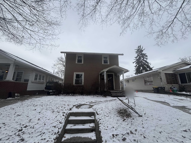 view of snow covered property