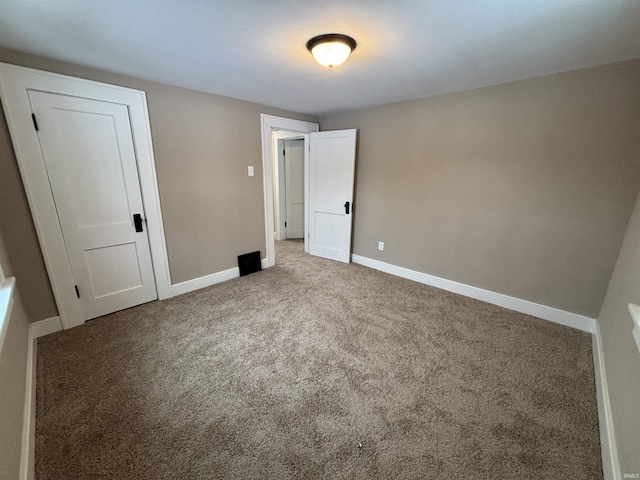 interior space with carpet floors and a closet