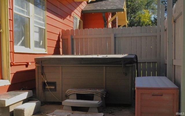 exterior space featuring a hot tub