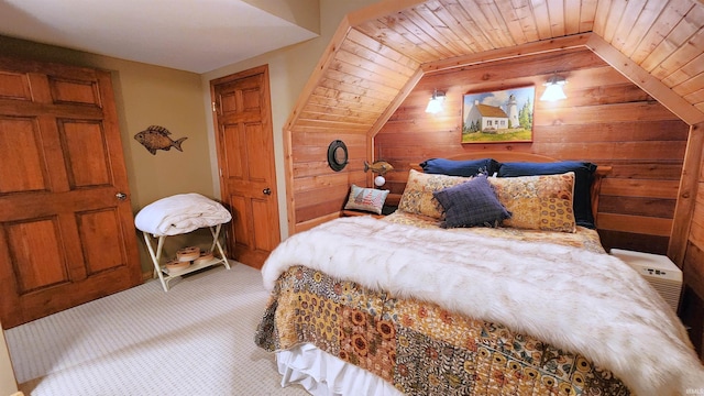 bedroom with carpet, wooden ceiling, and wooden walls