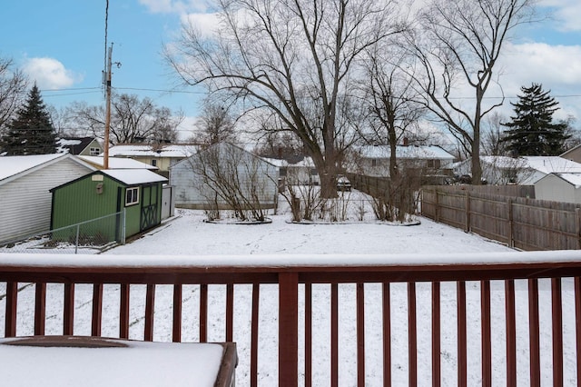 view of yard layered in snow