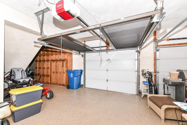 garage featuring a garage door opener