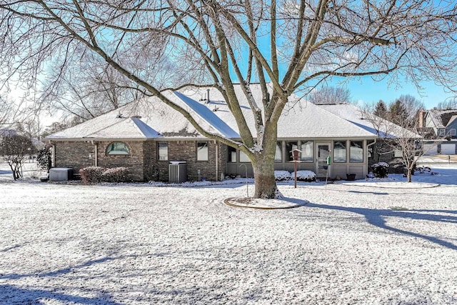 ranch-style house with central AC