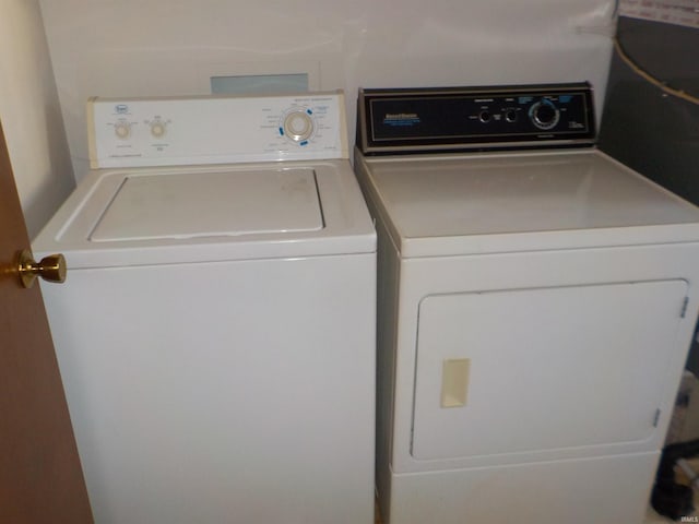 laundry room featuring independent washer and dryer