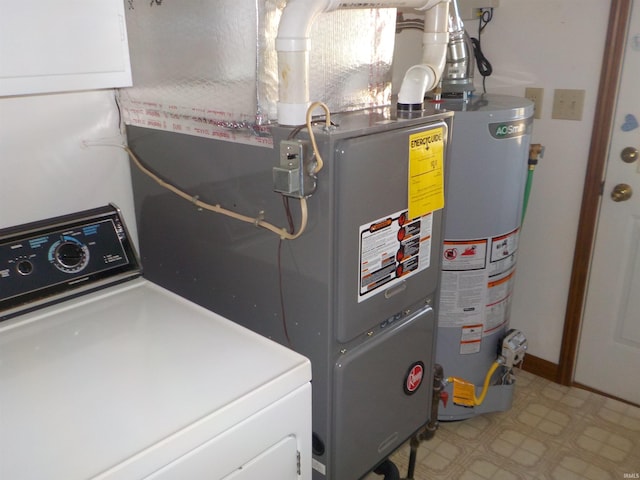 utilities featuring gas water heater and washer / clothes dryer