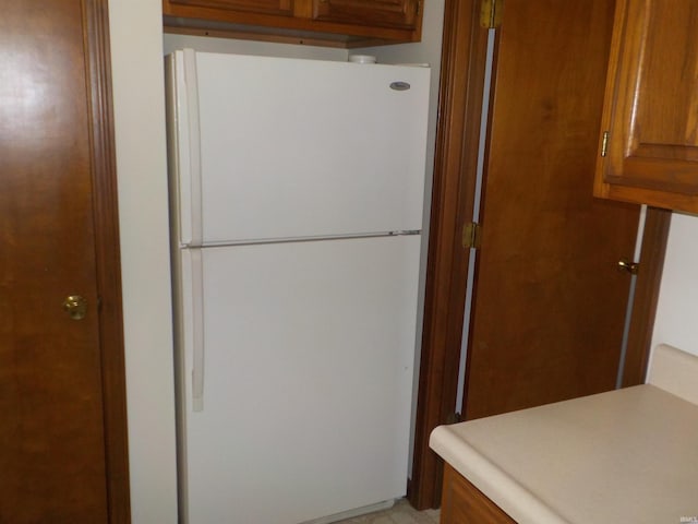 kitchen featuring white fridge