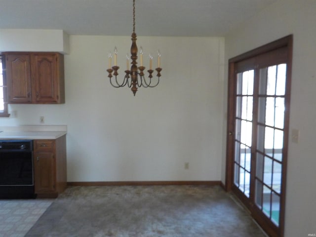 kitchen featuring light carpet, black dishwasher, hanging light fixtures, and an inviting chandelier