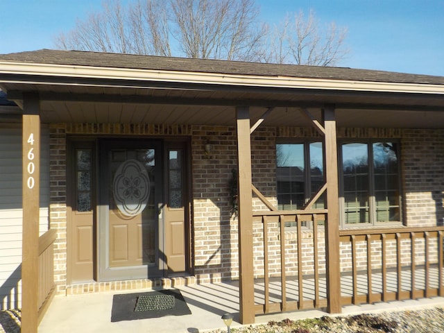 entrance to property with covered porch