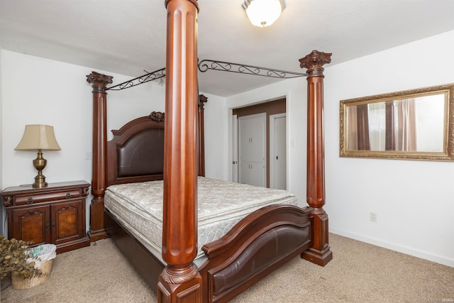 bedroom with light colored carpet