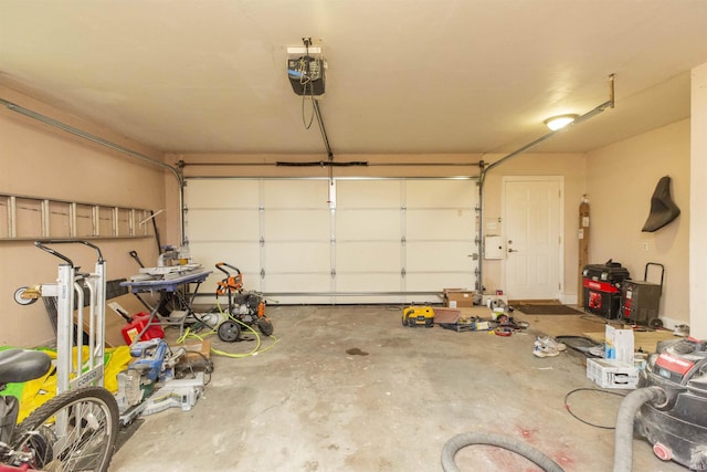 garage featuring a garage door opener