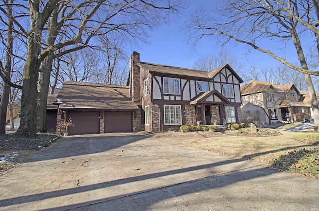 tudor home with a garage